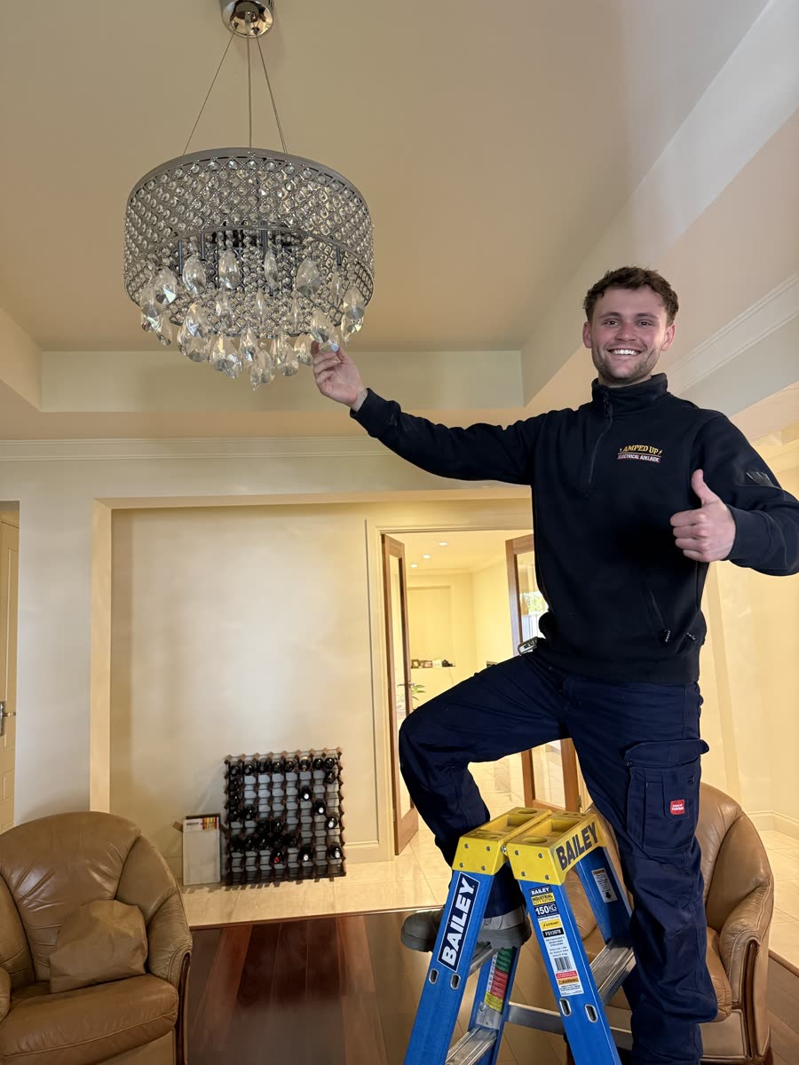 Crystal chandelier installed by Amped Up Electrical Adelaide in a high-ceilinged Adelaide home