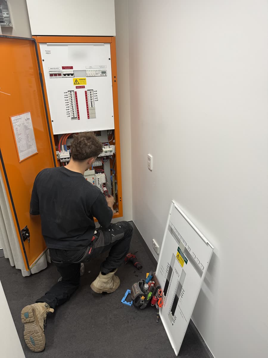 Commercial switchboard with essential services section, worked on by Amped Up Electrical Adelaide