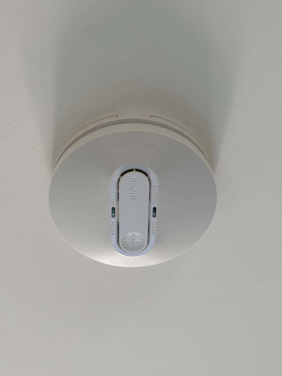 Smoke alarm installation Adelaide - hardwired interconnected photoelectric alarm by Amped Up Electrical