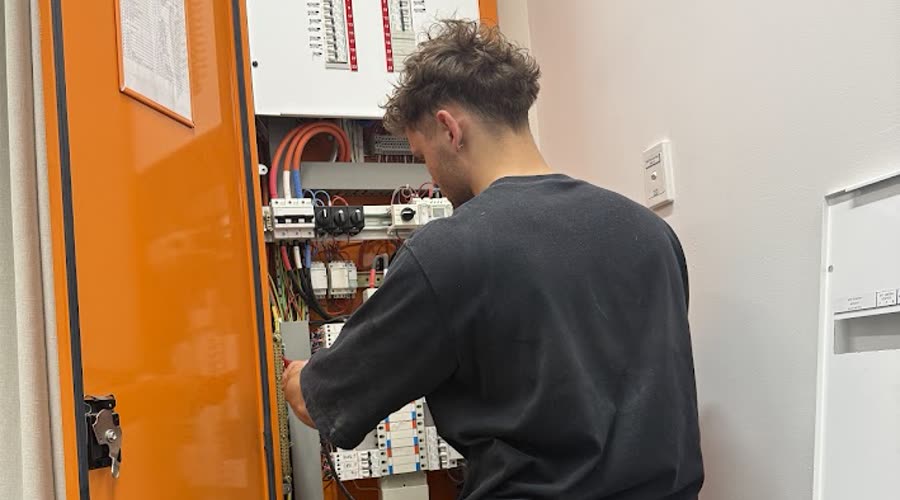 Marcus working on a commercial switchboard in Adelaide