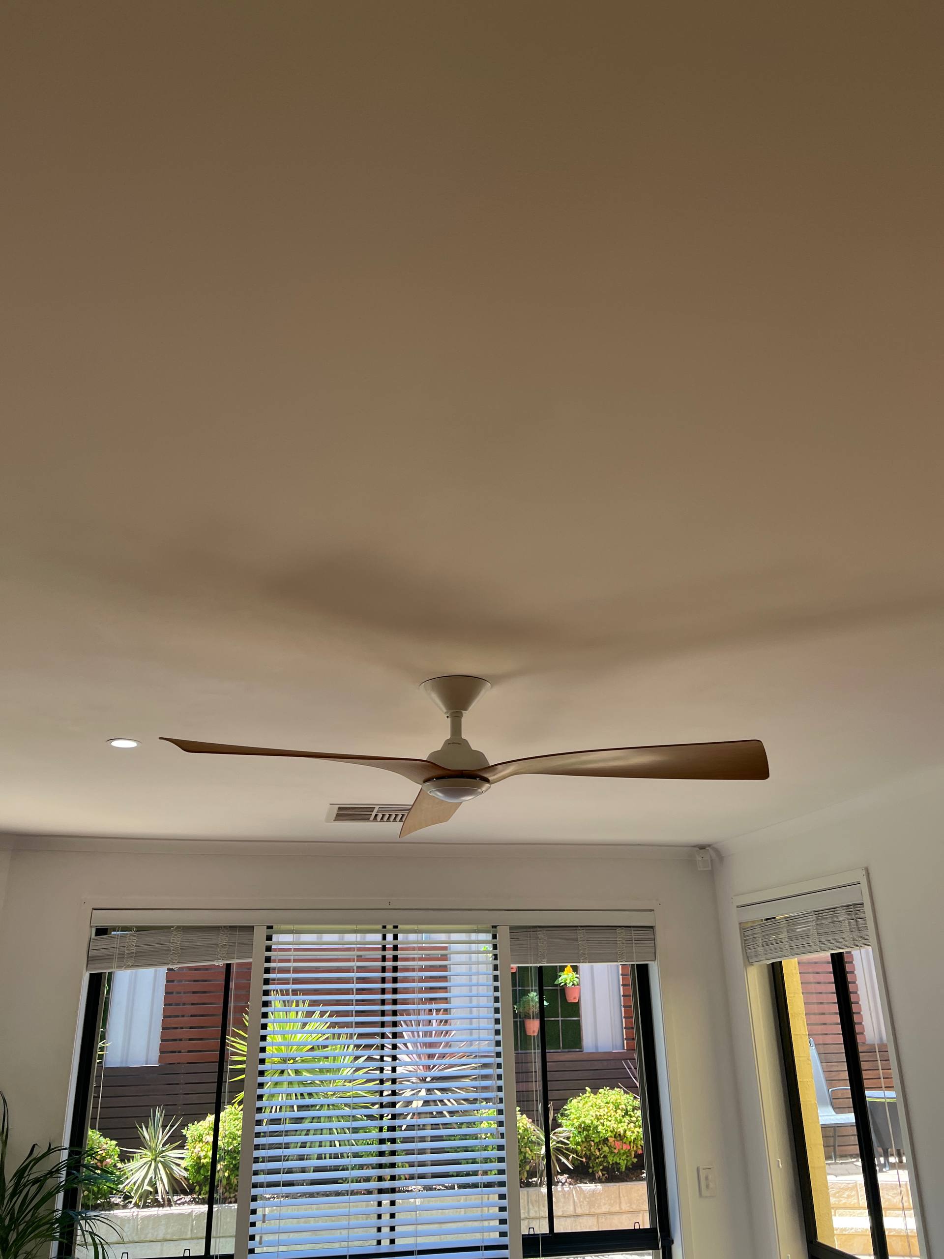 Professional ceiling fan installation Adelaide - modern DC fan with integrated light