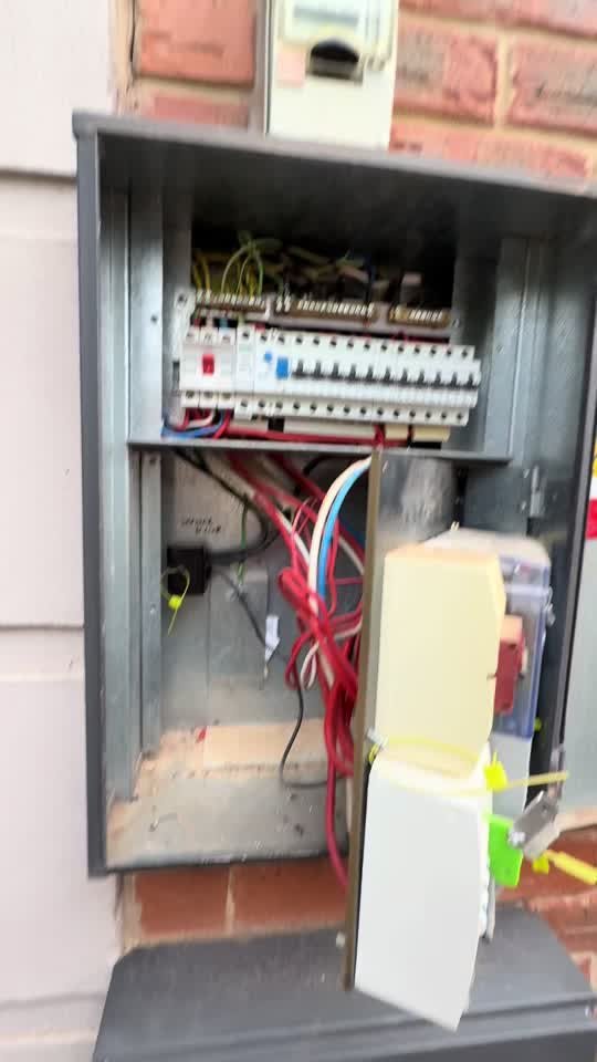 Burnt outdoor switchboard with melted wires - emergency fault find Adelaide