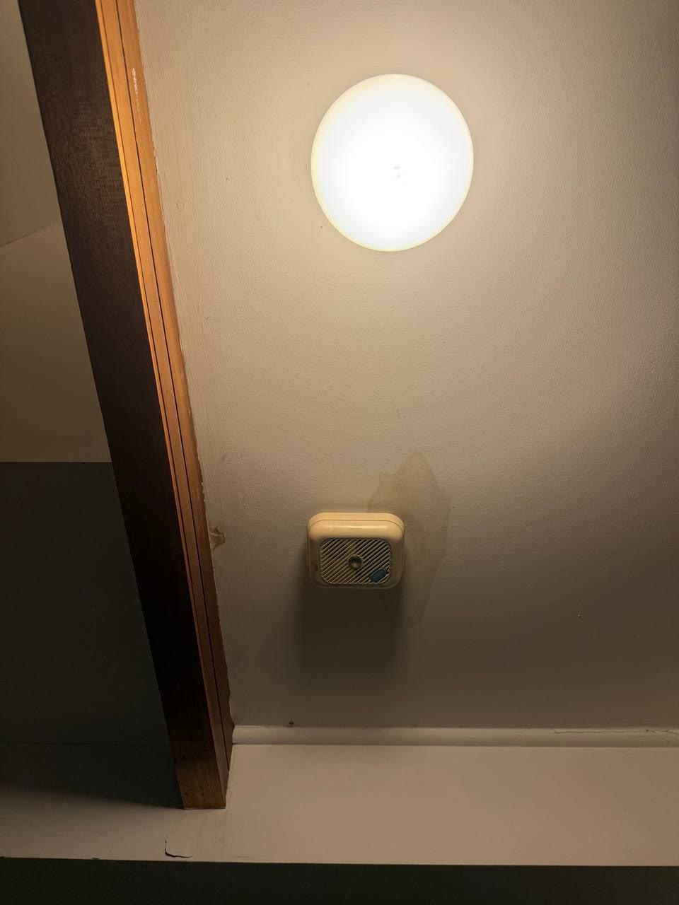 Smoke alarm fitted by the stairs